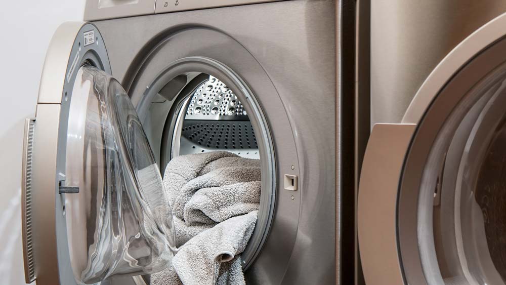 Clothes dryer full of towels