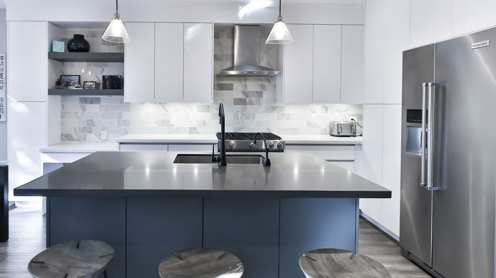 Sleek modern kitchen with large KitchenAid refrigerator